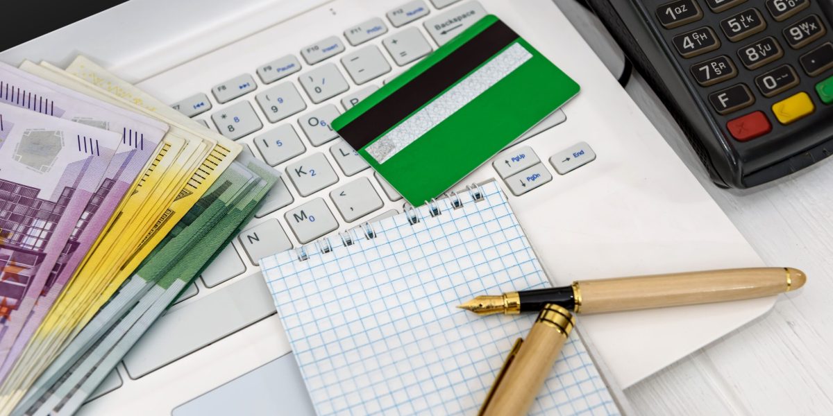 euro-banknotes-laptop-banking-terminal (1)